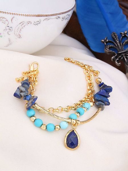 L'Atelier de Gaia Pozłacana bransoletka z lapis lazuli rozmiar: onesize. Niebieskie bransoletki damskie L'Atelier de Gaia, pozłacane. Za 74.63 zł.