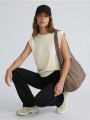 Legginsy flare z dzianiny technicznej - czarny. Czarne legginsy damskie Sinsay, l, bez wzorów, z dzianiny. Za 39.99 zł.