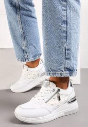 Biało-Srebrne Sneakersy na Koturnie z Metaliczną Wstawką i Suwakiem Dalinxa. Białe obuwie sportowe damskie Born2be, z jeansu, bez zapięcia. Za 99.99 zł.