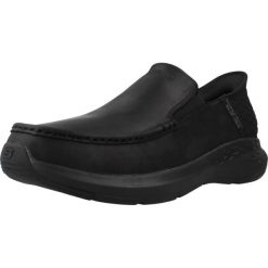 Trampki Skechers Model Slip-ins: Parson-oswin Kolor Czarny. Czarne trampki damskie Skechers, bez wzorów, z tkaniny, bez zapięcia. Za 389.99 zł.