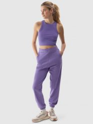 4F Spodnie dresowe joggery damskie - fioletowe XXL. Fioletowe spodnie dresowe damskie 4F, bez wzorów, z bawełny. W wyprzedaży za 79.99 zł.