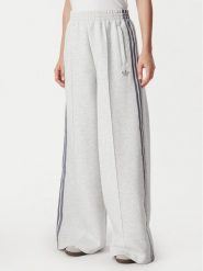 Adidas Spodnie dresowe Spacer HY8044 Szary jasny Wide Leg. Szare spodnie dresowe damskie Adidas, m, bez wzorów, z bawełny. Za 298.99 zł.