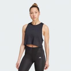 Koszulka Yoga Essentials Cropped. Czarne koszulki damskie Adidas, bez wzorów, bez kołnierzyka, bez ramiączek. Za 129.00 zł.