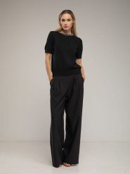 Tantra Spodnie w kolorze czarnym rozmiar: L. Czarne spodnie materiałowe damskie Tantra, bez wzorów, z materiału. Za 221.88 zł.