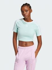 Adidas Koszulka w kolorze turkusowym rozmiar: XS. Niebieskie bluzki damskie Adidas, xs, bez wzorów, bez kołnierzyka, bez ramiączek. Za 80.33 zł.