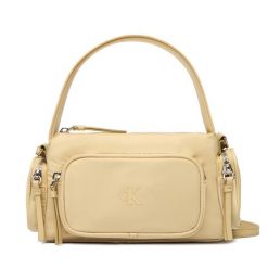 Torebka Calvin Klein. Żółte torebki klasyczne damskie Calvin Klein, z nylonu, bez dodatków. Za 449.99 zł.