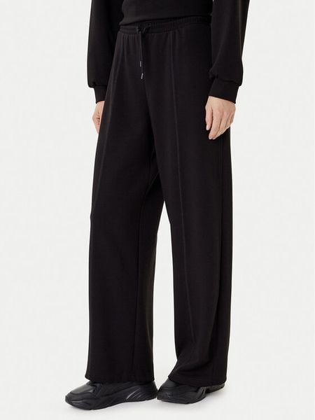 ONLY Spodnie dresowe Scarlet 15355811 Czarny Regular Fit. Czarne spodnie dresowe damskie Only, l, bez wzorów, z dresówki. Za 119.99 zł.