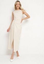 Jasnobeżowa Sukienka Dopasowana z Bawełną i Wiskozą z Rozcięciem Turilia. Brązowe sukienki damskie Born2be, bez wzorów, z bawełny, eleganckie, bez ramiączek. Za 139.99 zł.