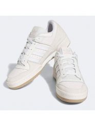 Adidas Skórzane sneakersy "Forum Low" w kolorze kremowym rozmiar: 38. Brązowe obuwie sportowe damskie Adidas, bez zapięcia. Za 316.24 zł.