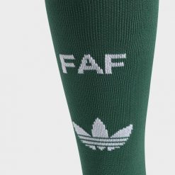 Getry wyjazdowe Algieria 26. Zielone legginsy sportowe damskie Adidas, l, bez wzorów, z bawełny, do piłki nożnej. Za 79.95 zł.