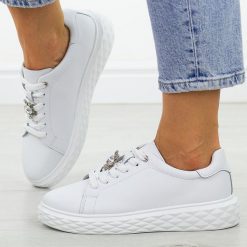 Białe wt skórzane sneakersy damskie Sergio Leone Sp110. Białe obuwie sportowe damskie Sergio Leone, na jesień, z jeansu, bez zapięcia. Za 199.00 zł.