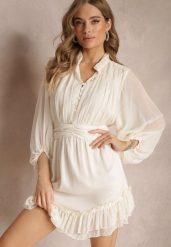 Beżowa Sukienka Mini z Ozdobnymi Guzikami i Rękawem 3/4 Parissa. Brązowe sukienki damskie Renee, bez wzorów, bez ramiączek. W wyprzedaży za 135.99 zł.