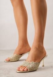 Złote Klapki na Metalicznej Szpilce z Koronkową Cholewką Thyxyphise. Żółte klapki damskie Born2be, z aplikacjami, z koronki, bez obcasa, na obcasie, bez zapięcia. Za 99.99 zł.