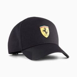 Czapka z daszkiem unisex Puma FERRARI czarna 02689102. Czarne czapki z daszkiem damskie Puma, bez wzorów, z materiału. Za 141.33 zł.