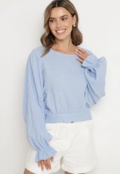 Jasnoniebieska Bluzka z Bawełny o Nietoperzowym Kroju z Wiązaniem Sepene. Niebieskie bluzki damskie Born2be, z aplikacjami, z bawełny, eleganckie, bez kołnierzyka, bez ramiączek. Za 99.99 zł.