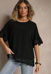 Czarna Bluzka Ozdobiona Ażurowymi Rękawami Vorana. Czarne bluzki damskie Renee, xl, w ażurowe wzory, z jeansu, eleganckie, bez kołnierzyka, bez ramiączek. Za 49.99 zł.