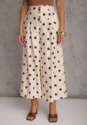 Beżowe Spodnie Casual Culottes w Groszki z Dużą Zawartością Wiskozy Thelialla. Brązowe spodnie materiałowe damskie Renee, bez wzorów, z jeansu, krótkie. Za 99.99 zł.