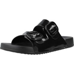 Sandały IGOR S10334 Czarny. Czarne sandały damskie IGOR, bez wzorów, z gumy, bez obcasa, bez zapięcia. Za 154.99 zł.