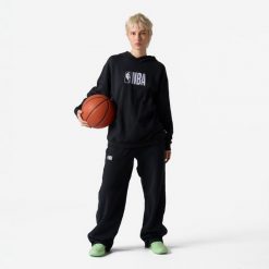 Spodnie do koszykówki unisex Tarmak NBA. Czarne spodnie sportowe damskie KIPSTA, m, bez wzorów, z bawełny, na fitness i siłownię. Za 129.99 zł.