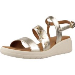 Sandały GEOX D MELICONIA Złoty. Żółte sandały damskie Geox, bez wzorów, z syntetyku, bez obcasa, bez zapięcia. Za 366.99 zł.