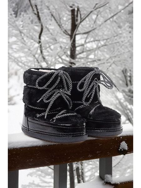 Trendyol Botki zimowe w kolorze czarnym rozmiar: 38. Czarne botki damskie Trendyol, na zimę, z materiału, bez obcasa, bez zapięcia. Za 165.31 zł.