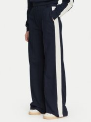 Guess Spodnie materiałowe V6YB26 K5139 Granatowy Relaxed Fit. Niebieskie spodnie dresowe damskie Guess, z aplikacjami, z materiału. Za 434.99 zł.