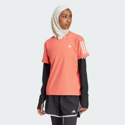 Koszulka Own The Run. Białe koszulki damskie Adidas, l, bez wzorów, z materiału, bez kołnierzyka, bez ramiączek. Za 149.00 zł.
