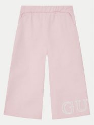 Guess Spodnie dresowe K5RQ11 KA6R4 Różowy Regular Fit. Czerwone spodnie dresowe dziewczęce Guess, z aplikacjami, z bawełny. Za 99.99 zł.