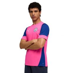 Treningowa koszulka Manchester City. Czerwone bluzki damskie Puma, bez wzorów, sportowe, bez kołnierzyka, bez ramiączek. Za 254.00 zł.