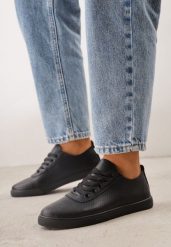 Czarne Sznurowane Tenisówki przed Kostkę na Płaskiej Podeszwie z Ozdobną Perforacją Assenia. Czarne obuwie sportowe casual damskie Born2be, bez wzorów, przed kostkę, bez zapięcia. Za 59.99 zł.