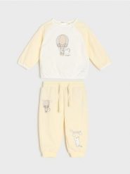 Bawełniany komplet: bluza i spodnie Moomin - kremowy. Białe bluzy damskie Sinsay, l, bez wzorów, z bawełny, bez kaptura. Za 25.99 zł.