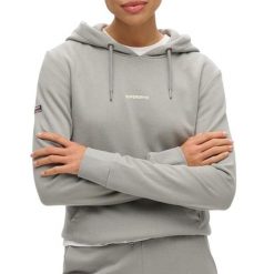 Jednokolorowa bluza z kapturem damska Superdry. Niebieskie bluzy damskie Superdry, xl, bez wzorów, z bawełny, z kapturem. Za 318.75 zł.