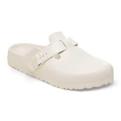 Klapki damskie Birkenstock Boston Eva Eggshell. Białe klapki damskie Birkenstock, bez wzorów, z materiału, bez obcasa, bez zapięcia. Za 389.00 zł.