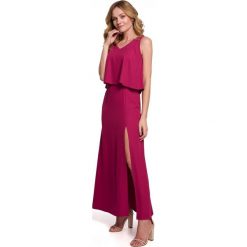 Długa zmysłowa sukienka z falbaną i rozcięciem niebieska. Niebieskie sukienki damskie Sukienki.shop, bez wzorów, eleganckie, bez ramiączek. Za 349.00 zł.