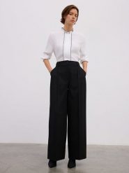 BGN Spodnie w kolorze czarnym rozmiar: 38. Czarne spodnie materiałowe damskie BGN, bez wzorów, z materiału. Za 121.51 zł.