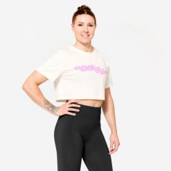Koszulka fitness damska Domyos crop top. Białe bluzki damskie DOMYOS, s, bez wzorów, z bawełny, bez kołnierzyka, bez ramiączek. W wyprzedaży za 39.99 zł.