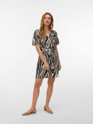 Vero Moda Sukienka w kolorze beżowo-czarnym rozmiar: XL. Brązowe sukienki damskie Vero Moda, bez wzorów, z tkaniny, bez ramiączek. Za 105.14 zł.