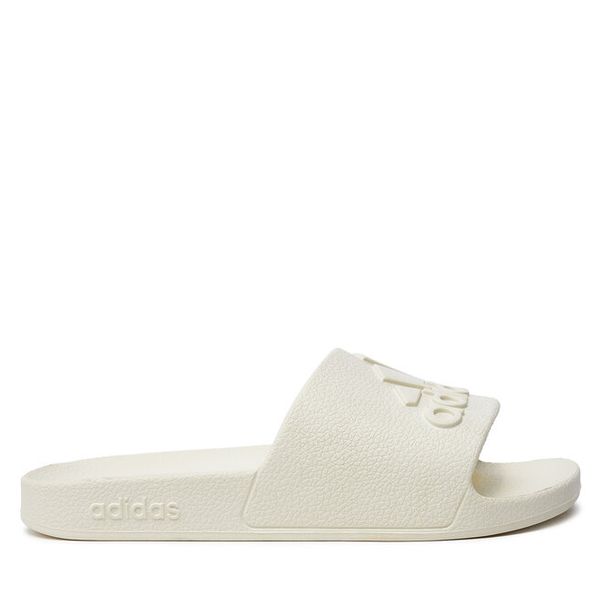 Klapki adidas. Białe klapki damskie Adidas, bez wzorów, bez obcasa, bez zapięcia. Za 99.99 zł.