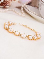 L'Atelier de Gaia Pozłacana bransoletka z perłami rozmiar: onesize. Białe bransoletki damskie L'Atelier de Gaia, pozłacane. Za 122.96 zł.