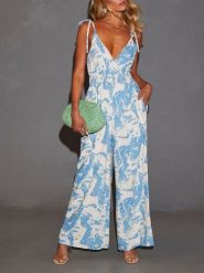 Milan Kiss Kombinezon w kolorze błękitno-białym rozmiar: L. Białe kombinezony damskie Milan Kiss, l, bez wzorów, z wiskozy, bez kołnierzyka, bez ramiączek. Za 179.64 zł.