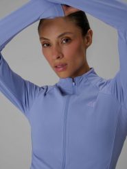4F Bluza do jogi slim szybkoschnąca damska - niebieska L. Niebieskie kardigany damskie 4F, l, bez wzorów, z włókna. Za 199.99 zł.