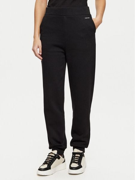 Calvin Klein Spodnie dresowe K20K208330 Czarny Relaxed Fit. Czarne spodnie dresowe damskie Calvin Klein, l, bez wzorów, z bawełny. Za 239.99 zł.