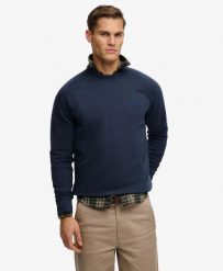 Superdry Bluza crew z raglanowymi rękawami Loose Fit – CLASSIC NAVY. Niebieskie bluzy damskie Superdry, l, bez wzorów, z bawełny, bez kaptura. Za 254.45 zł.