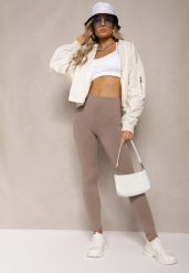 Ciemnobeżowe Legginsy z Gumką w Talii z Długimi Nogawkami Caleta. Brązowe legginsy damskie Renee, s, bez wzorów, z jeansu. Za 19.99 zł.
