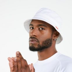 Kapelusz żeglarski Decathlon Sailing 100. Białe kapelusze damskie TRIBORD, bez wzorów, z bawełny, sportowe. Za 49.99 zł.