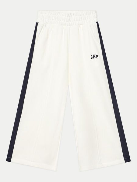 Gap Spodnie dresowe 745910-00 Biały Relaxed Fit. Białe spodnie dresowe dziewczęce GAP, bez wzorów, z bawełny. Za 99.99 zł.