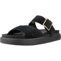 Sandały CLARKS ARISTELLA MULE Czarny. Czarne sandały damskie Clarks, bez wzorów, ze skóry, bez obcasa, bez zapięcia. Za 236.99 zł.