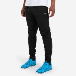 Spodnie piłkarskie Kipsta Essential. Czarne spodnie dresowe damskie KIPSTA, xl, bez wzorów, z dresówki. Za 69.99 zł.