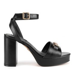 Sandały Nine West. Żółte sandały damskie Nine West, bez wzorów, bez obcasa, na koturnie, bez zapięcia. Za 229.99 zł.