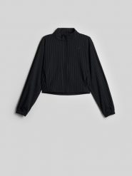 4F Bluza dresowa relaxed bez kaptura damska - czarna XL. Czarne kardigany damskie 4F, xl, bez wzorów, z dresówki. Za 199.99 zł.